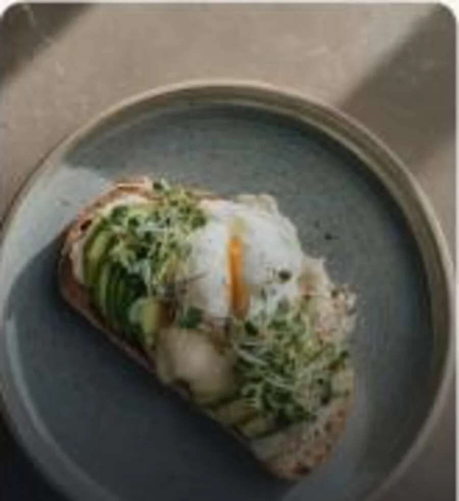 Savory toast served on a ceramic plate